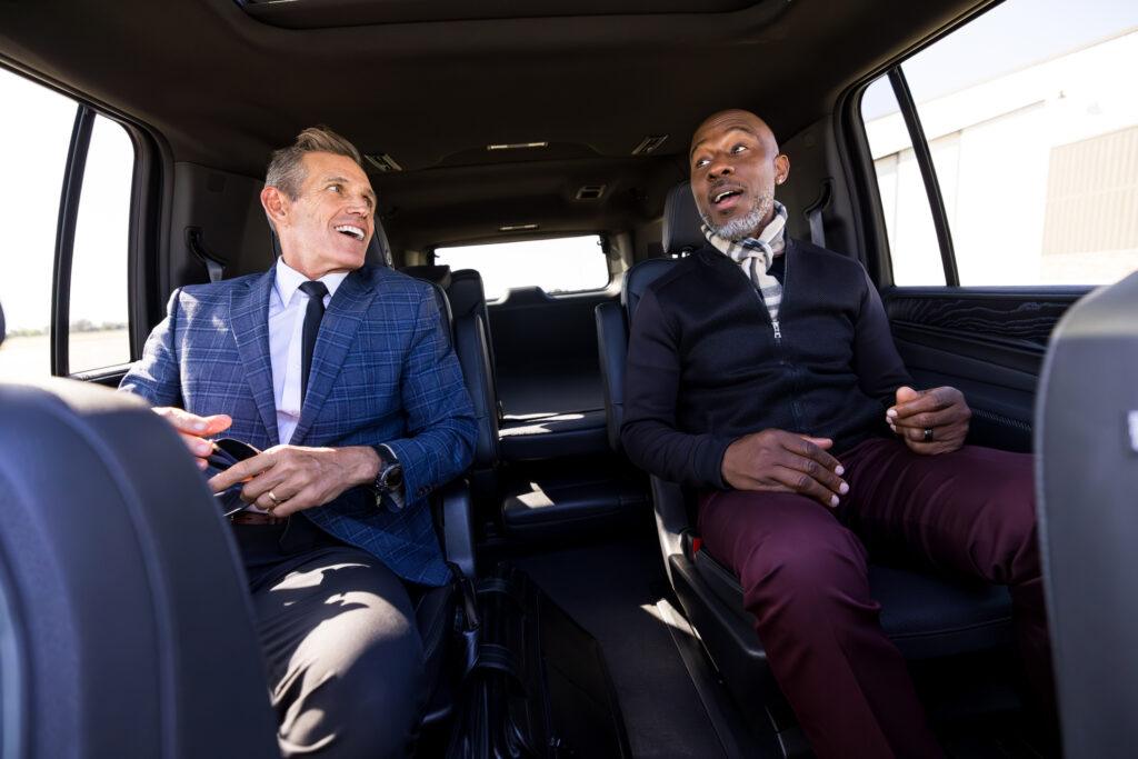 Business Partners In a Luxury SUV